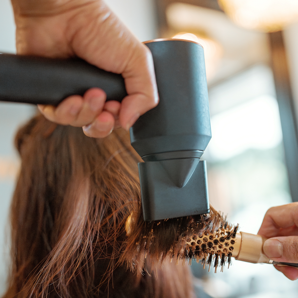 Professional hair blowout styling at Salon LáShae in Kannapolis, NC