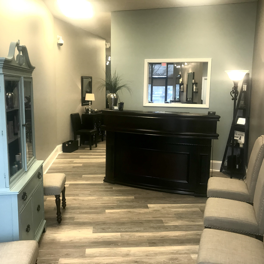 Welcoming reception area and front desk at Salon LáShae in Kannapolis, NC